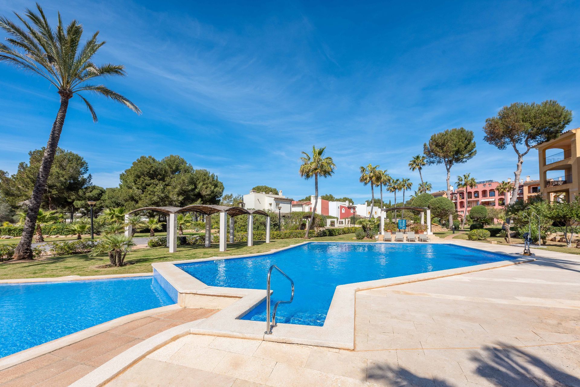 Mediterranean-style apartment buildings and gardens at the Belavent complex, Nova Santa Ponsa